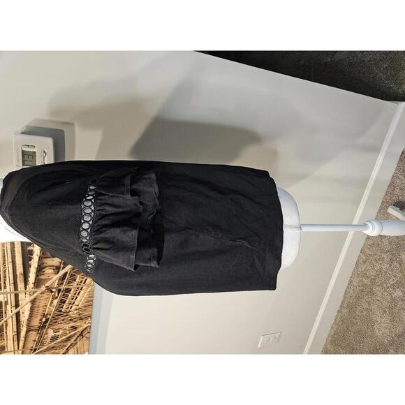 CeCe Stylish Black Puff Sleeve Top with Cut-Out Detail - Picture 2 of 5